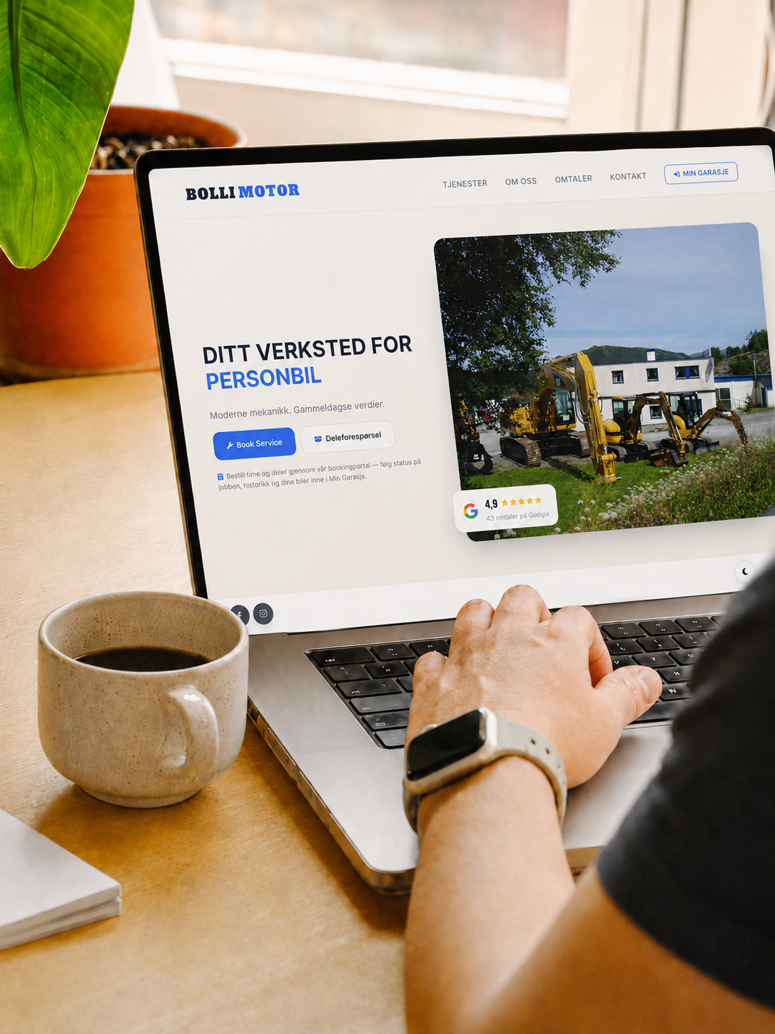 Verkstedets ferdige nettside på laptopen
